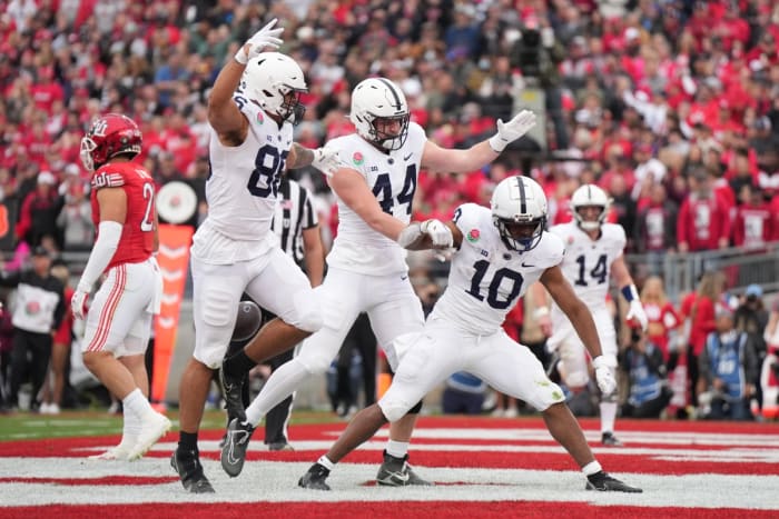 Penn State running back Nicholas Singleton celebrates after scoring a touchdown